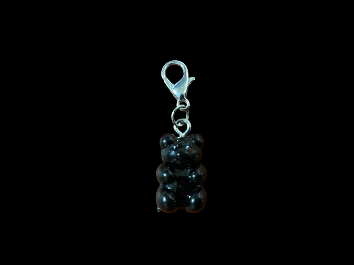 Black Plastic and Metal Charm